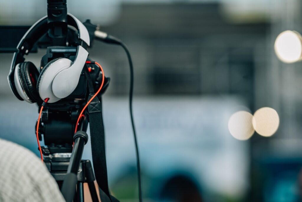 Live streaming. Camera at a Press Conference.