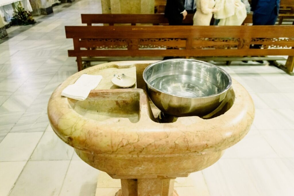 Baptismal font in a catholic church.Baptismal font in a catholic church.