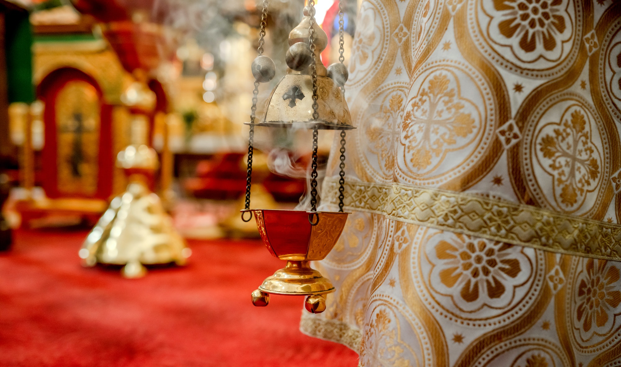 The priest's incense in a hangs in the Orthodox Church